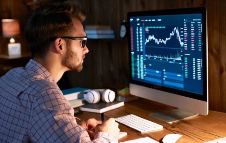 man looking at price chart