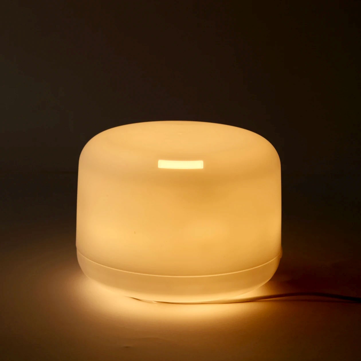 Muji diffuser glowing with light